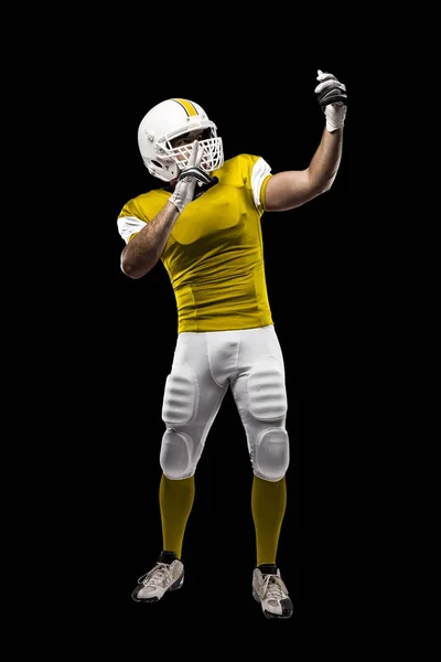 Jugador de fútbol con uniforme amarillo — Foto de Stock