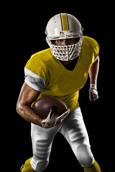 Jogador de futebol com uniforme amarelo — Fotografia de Stock