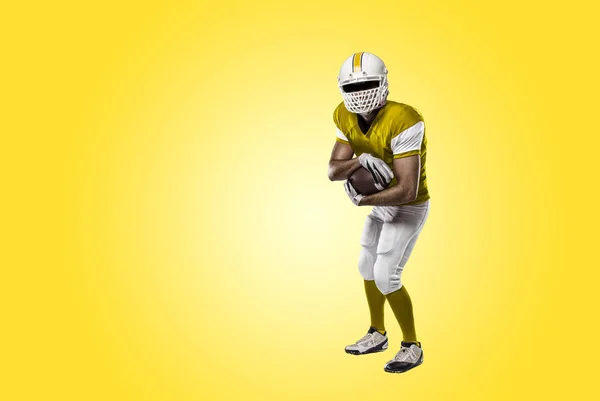 Football Player with a yellow uniform — Stock Photo, Image