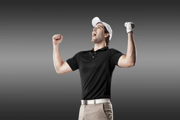 Jogador de golfe em uma camisa preta — Fotografia de Stock