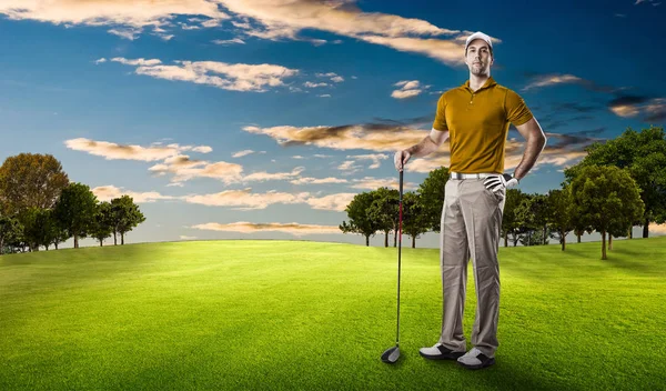 Golf Player in a orange shirt — Stock Photo, Image