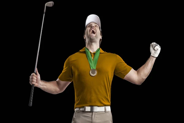 Golf oyuncu turuncu gömlekli — Stok fotoğraf