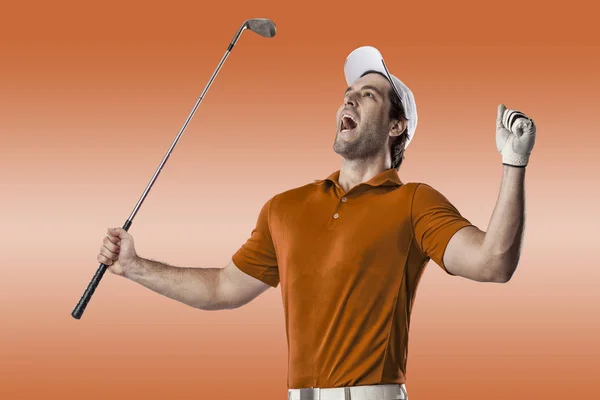 Гольфіст в помаранчевий сорочки — стокове фото