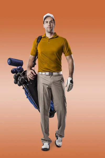 Golf Player in a orange shirt — Stock Photo, Image