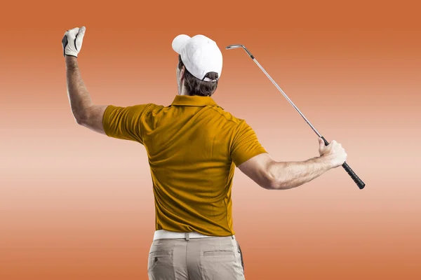 Golf Player in a orange shirt — Stock Photo, Image