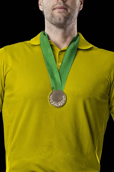 Jugador de golf con camisa amarilla —  Fotos de Stock