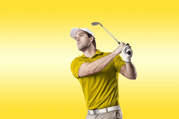 Golf Player in a yellow shirt — Stock Photo, Image