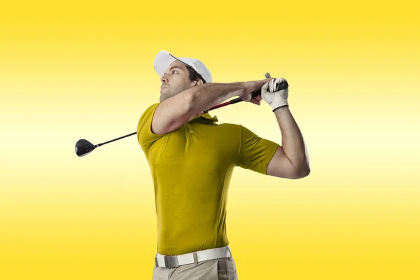 Golf Player in a yellow shirt — Stock Photo, Image