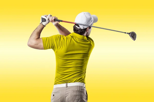 Golf Player in a yellow shirt — Stock Photo, Image