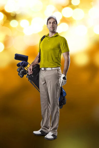 Golf Player in a yellow shirt — Stock Photo, Image