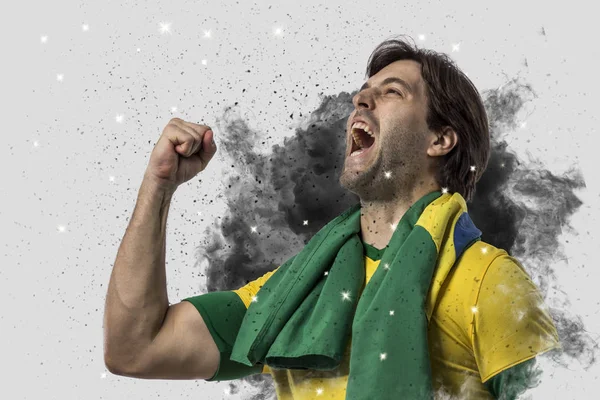 Brasilianischer Fußballer kommt aus einer Rauchwolke — Stockfoto