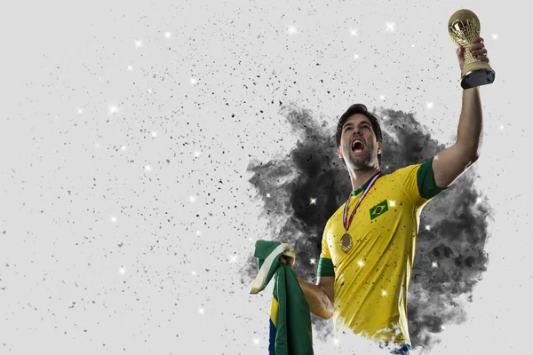 Brazilian soccer player coming out of a blast of smoke — Stock Photo, Image