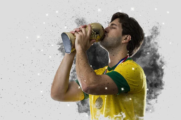 Brazilian soccer player coming out of a blast of smoke — Stock Photo, Image