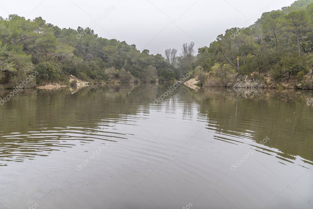 Small Lake in Terrassa, Barcelona, Spain in a cloudy day.