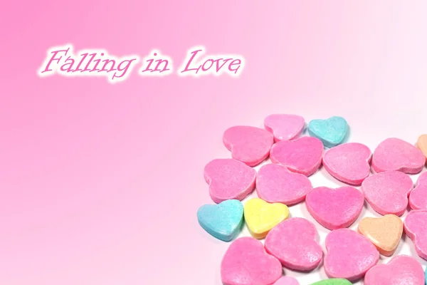 Abstract love candy with text Falling in love — Stock Photo, Image