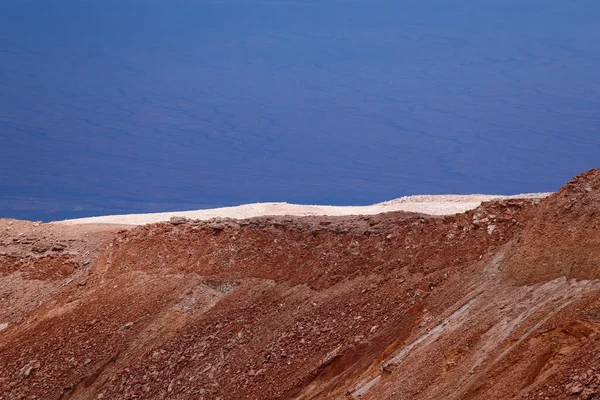 View of the landscape of the Atacama Desert. The rocks of the Mars Valley (Valle de Marte) and Cordillera de la Sal, Atacama Desert, Chile