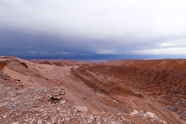 View of the landscape of the Atacama Desert. The rocks of the Mars Valley (Valle de Marte) and Cordillera de la Sal, Atacama Desert, Chile