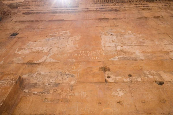 Inscriptions of ancient travelers in the Temple of Bacchus. The ruins of the Roman city of Heliopolis or Baalbek in the Beqaa Valley. Baalbek, Lebanon - June, 2019
