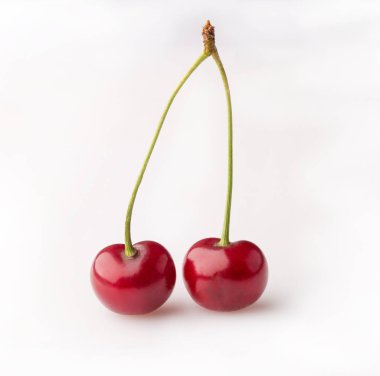 Berries of ripe sweet cherry on a white background