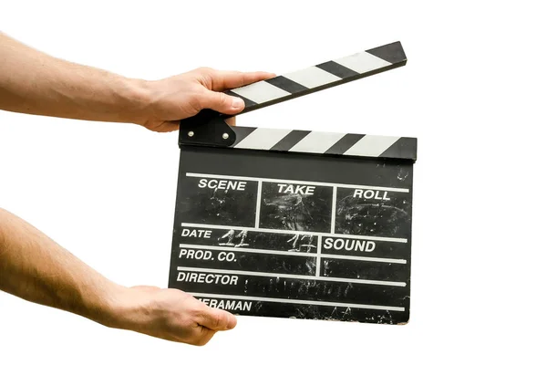 Beyaz arka plan üzerinde izole bir film Klaket ile el