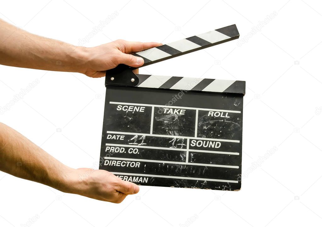 Hands with a movie clapperboard isolated on white background