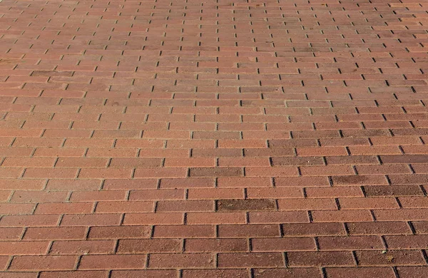 Brick floor of orange bricks — Stock Photo, Image
