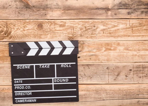 Clapperboard su fondo legno — Foto Stock