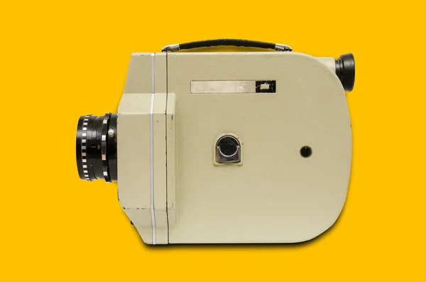 vintage cinema camera on yellow