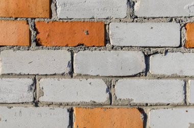 Beyaz-turuncu tuğla duvar dokusu