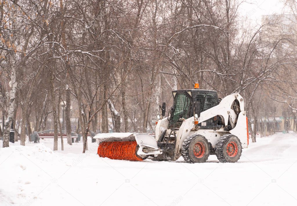 mini tractor with snow removal equipment