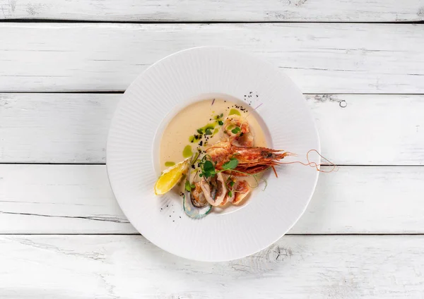 Italian seafood soup with cream cheese on white wood background — Stock Image Italian Seafood Soup Cream Cheese White Wood Background Stock Picture