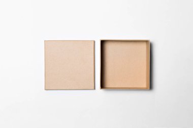 Kahverengi Kağıt Kağıt ya da Kapaklı Kutu Mockup beyaz arka planda izole edilmiş. Üst manzara. Kırpma yolu ile nesne. Yüksek çözünürlüklü fotoğraf.