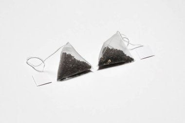 Tea Bag Mockup 'ın beyaz arkaplanda izole edilmiş hali. Tek kullanımlık çay poşeti. Yüksek çözünürlüklü fotoğraf..