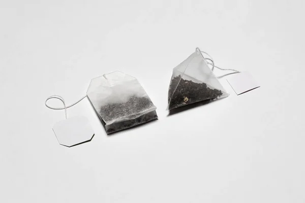 Detailní Záběr Tea Bag Mockup Etiketou Izolované Bílém Pozadí Jednorázový — Stock fotografie