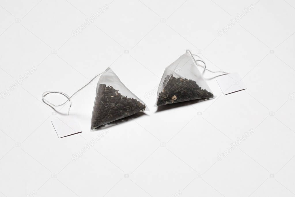 Close-up of Tea Bag Mockup with label isolated on white background. Disposable Tea Bag.High-resolution photo.