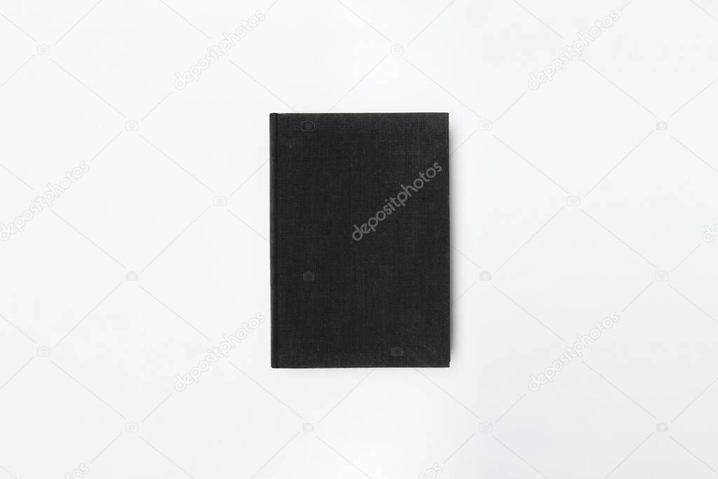 Blank black Hardcover Book Mock-Up isolated on white background. High-resolution photo.