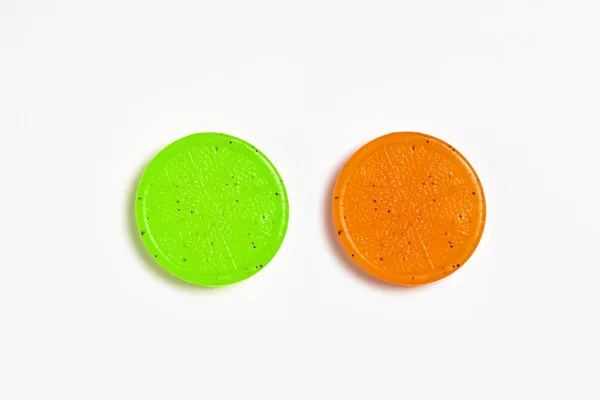 Orange and Lime round Soap isolated on white background.High-resolution photo.