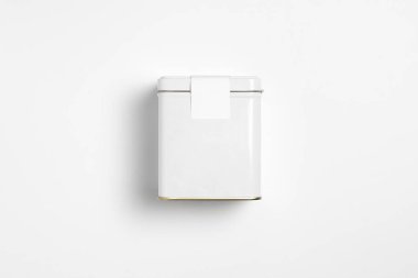 Beyaz kare Tin Packaging Beyaz arka planda Mock. Çay, kahve, kuru ürünler. Teneke kutu. Yüksek çözünürlüklü fotoğraf.