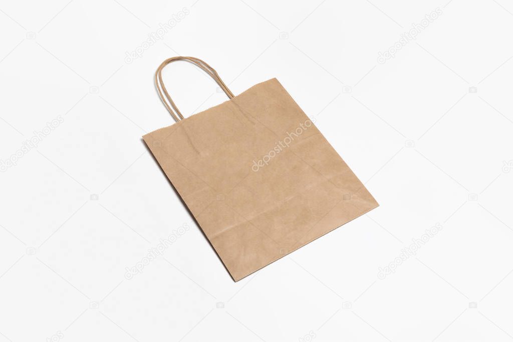 Recycled Paper Shopping Bag Mockup on white background.High-resolution photo.High-resolution