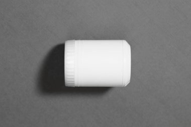 Gri arkaplanlı plastik kavanoz modeli. Yüksek çözünürlüklü fotoğraf..