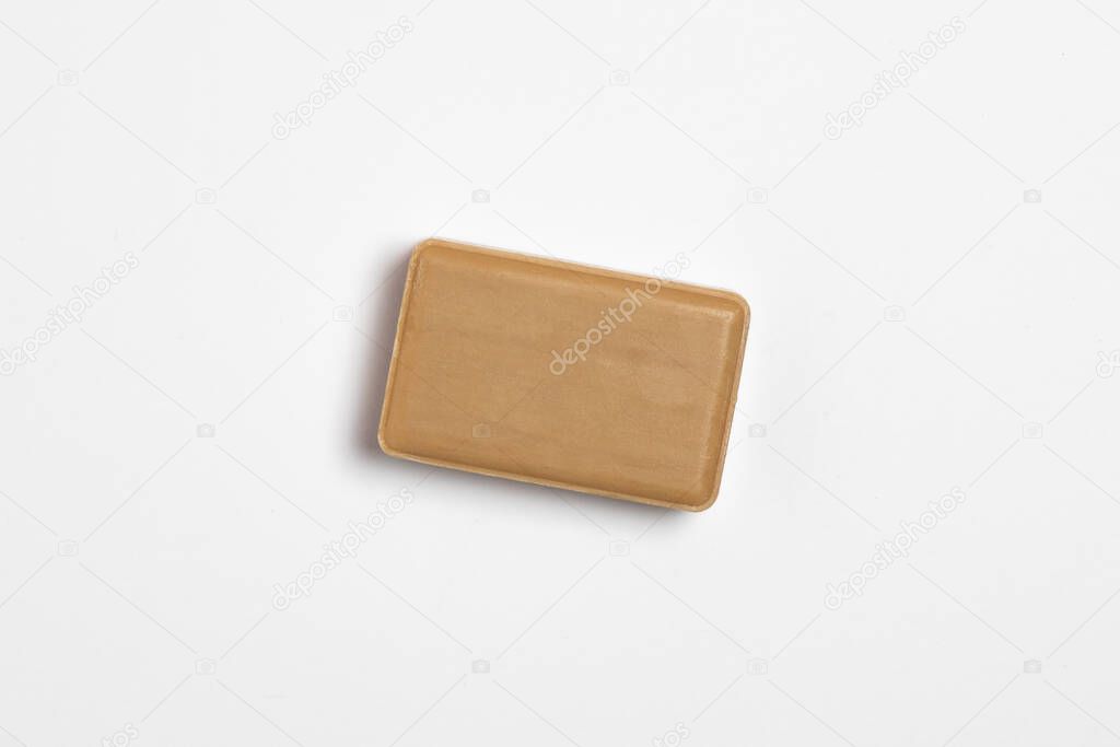 Brown Soap on a white background. Mock-up, a place for your label. Antibacterial soap.High-resolution photo.Top view.