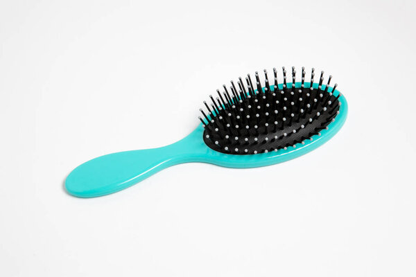 Hairbrush isolated on white background. High-resolution photo.Top view.