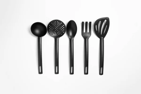 Set Black Plastic Kitchen Utensils Consisting Kitchen Skimmer Spatula Kitchen — Stock Photo, Image