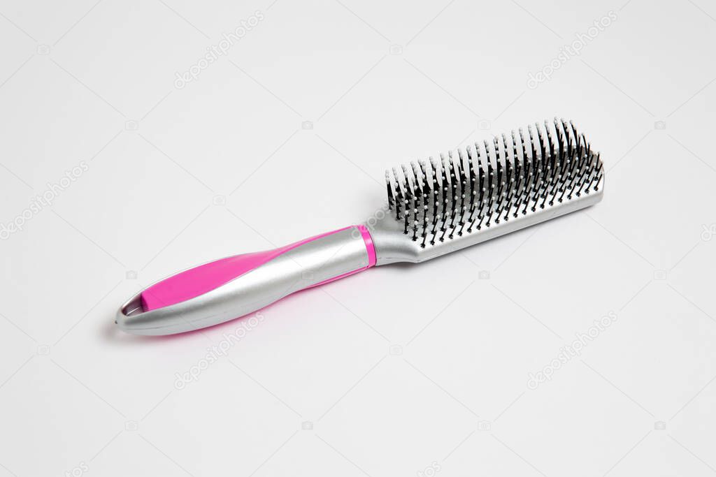 Hairbrush isolated on white background. High-resolution photo.Top view.