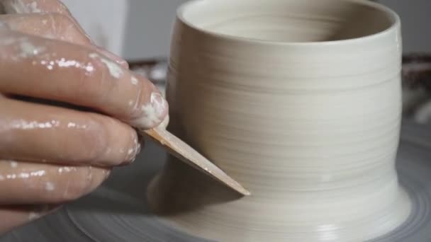 Clay pot spinning on pottery wheel — Stock Video