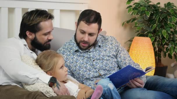 Homosexual Male Couple with daughter in bedroom — Αρχείο Βίντεο