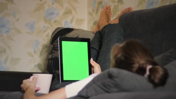 Woman with coffee use digital tablet — Stock Video