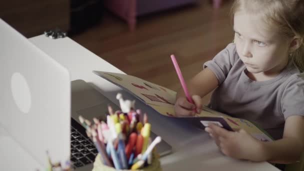 Little Girl Learning Remotely At Home — Stock Video