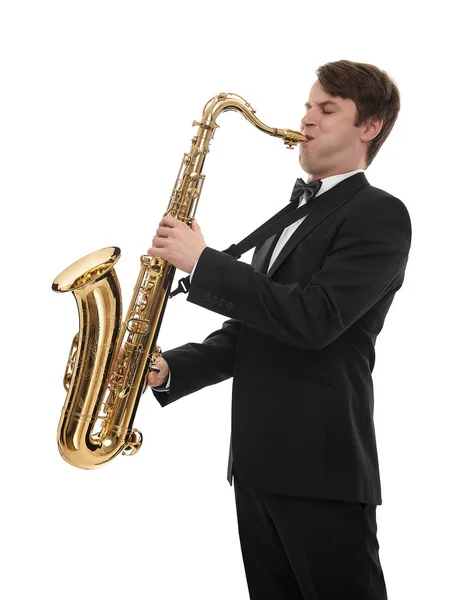 Saxophonist in a tuxedo plays music on sax. — Stock Photo, Image