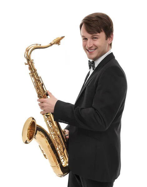 Attractive saxophonist with a saxophone in suit. — Stock Photo, Image
